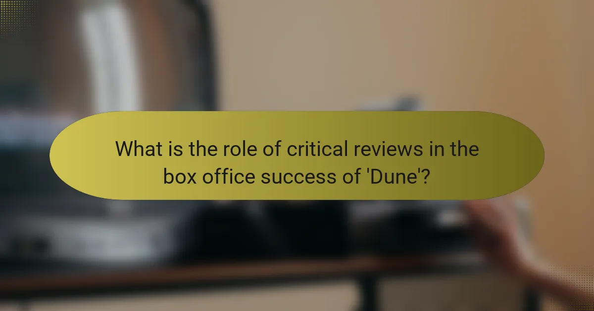 What is the role of critical reviews in the box office success of 'Dune'?